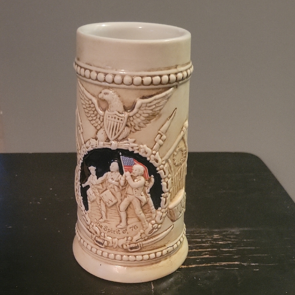 Cream and Blue Ceramic Drinkware with Classical Relief Design